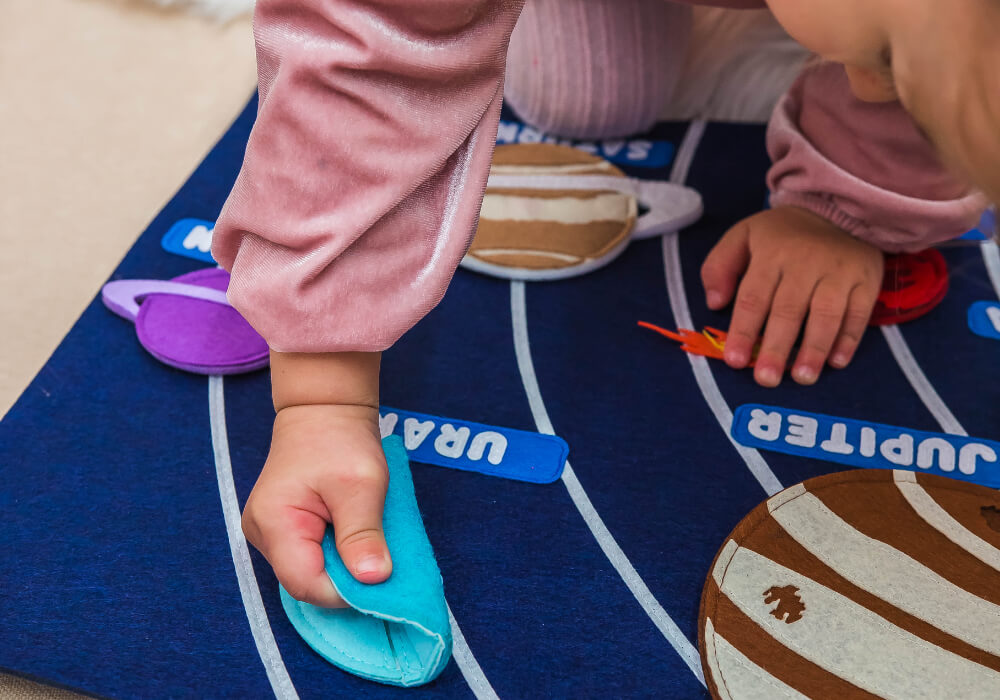 Detachable Planets in Solar System Toy Detachable planets included in the solar system educational toy for interactive play.