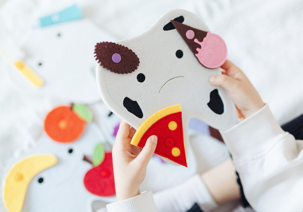 Educational Toy for Teaching Kids About Brushing Teeth Educational toy that helps kids learn about brushing their teeth and the importance of dental care in a playful manner